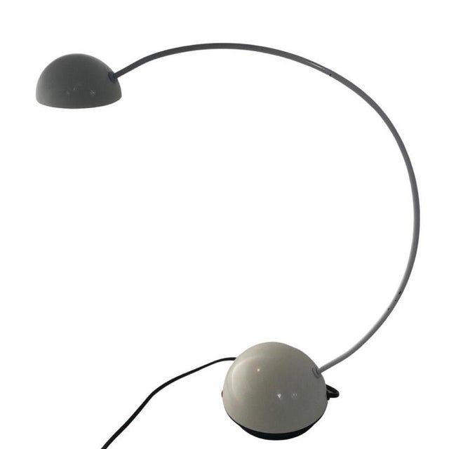 Vintage desklamp in postmodern style. A playful design and made from metal and a round base. In working condition with...