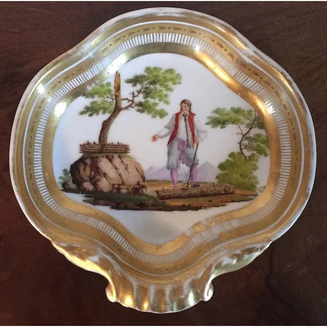 Antique Early 19th-century French porcelain shell shape dish decorated with a Revolutionary figure in landscape. Expert...