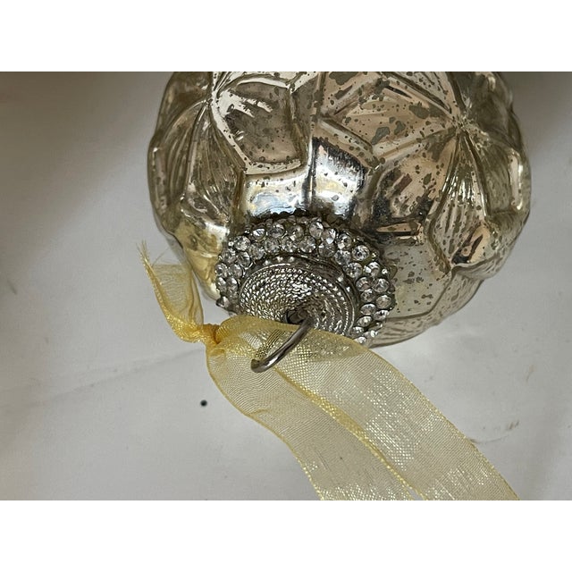 10 pcs gorgeous 3 d glass baubles in different colors, in two original boxes.