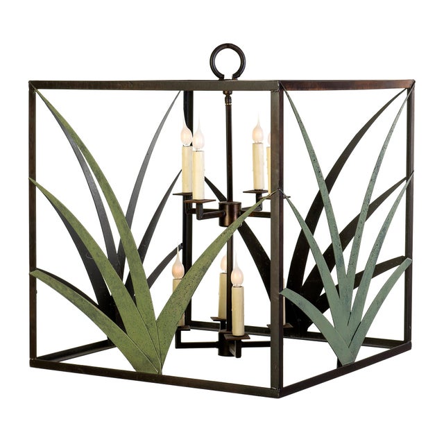 Handcrafted from steel, the Marsh Grass Lantern is inspired by the beautiful marsh grass that thrives in the Lowcountry...
