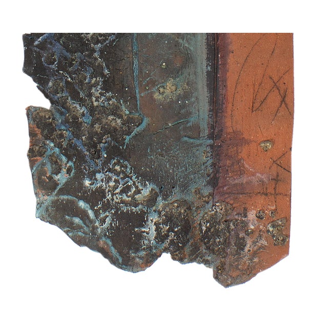 A mixed media wall sculpture titled Series 16, #3 by American artist Juliet Holland (1937-2017). Composed of clay, the...