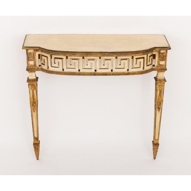 Italian Neoclassical Style Gilt and Cream Painted Console Table, with Greek key motif and two fluted tapered legs, "Made...