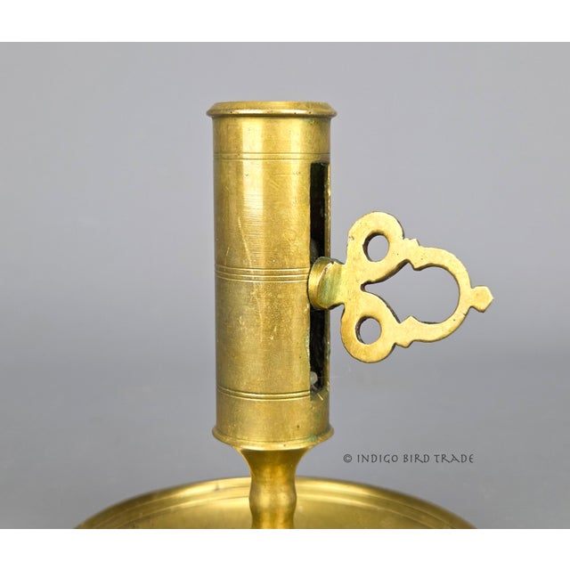 Antique Swedish Solid Brass Push-Up Candlestick Holder This beautiful candle holders is made of solid brass. It features a...
