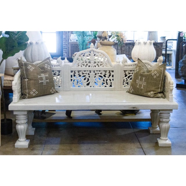 This exceptional hand-carved garden bench is a true masterpiece, crafted with meticulous detail and showcasing the...