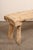 A Spanish rustic wooden bench from the 19th century. This antique bench from Spain has been constructed of a single and...