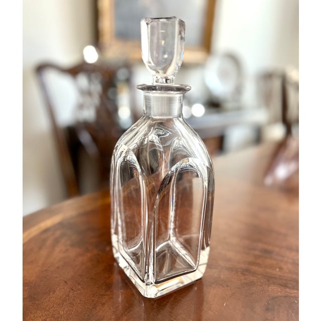 Orrefors heavy lead crystal decanter. Rectangular design. Monogrammed stopper. Maker's mark engraved on the underside....