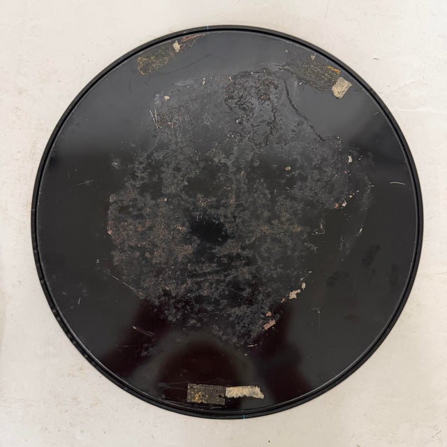 Vintage 1960s souvenir tray depicting a map of the state along with a golden poppy sprig. Gold design on black background....