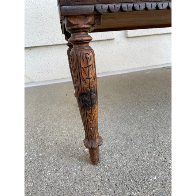 19th century Anglo Indian hardwood three level server or shelf with pine cone finials. The shelves with galleries...