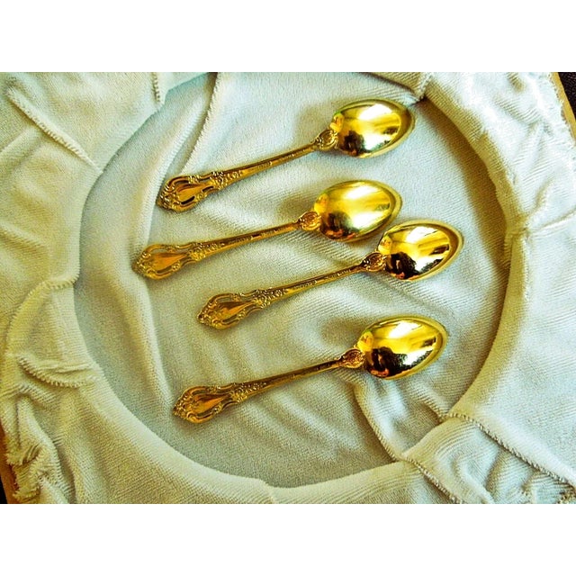 Lunt Silversmiths vermeil sterling silver set of 4 demitasse spoons in the Eloquence pattern. Designed by Nord Bowlen and...