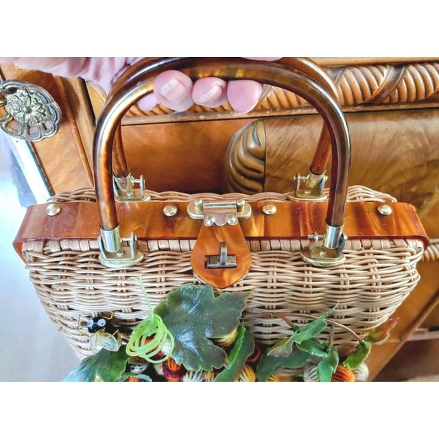 Here's an adorable wicker and Lucite Princess Charming purse made by Atlas in Hollywood, Florida circa 1960s. The kitschy...