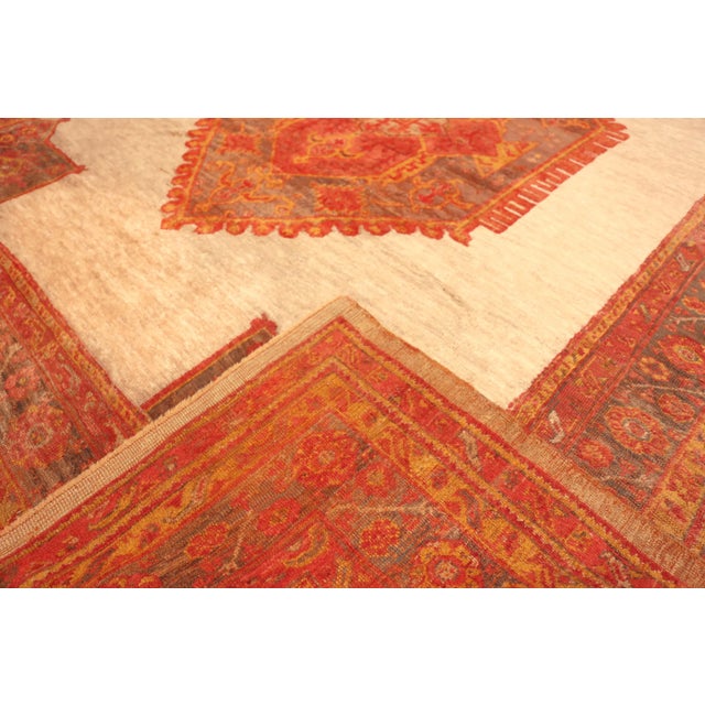 Antique Turkish Oushak Angora Rug, Origin: Turkey, Circa: 1900 Discover the elegance of this Antique Turkish Oushak Angora...