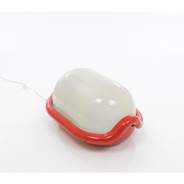 Floor lamp Noce designed by Achille Castiglioni and produced by Flos, 1970s. It owes its name to the rounded shape that...