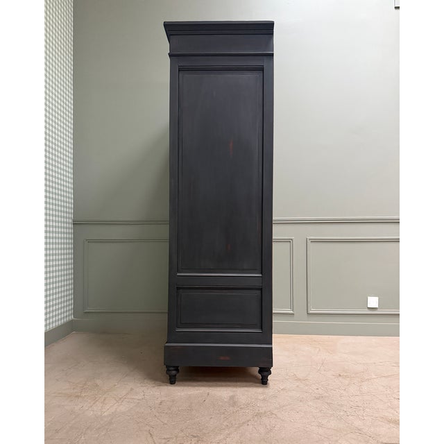 Elegant and full of character, this late 19th-century bookcase captivates with its clean lines and timeless appeal...