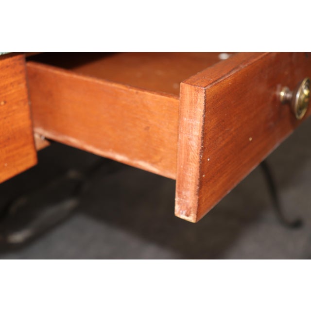 A striking example of French Directoire design, this elegant desk seamlessly combines the refined architectural lines of...