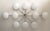 Italian midcentury flush mount with ten glossy white Murano glass shades mounted on solid brass frame in polished chrome...