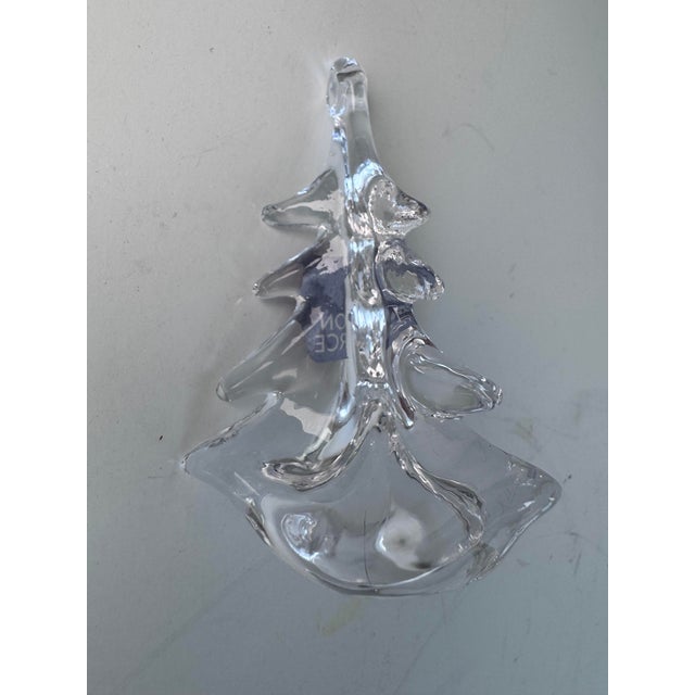 A wonderful hand blown ornament from Simon Pearce in Vermont. It includes all the original packing & label.