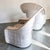 Fabulous pair of Split Rattan Fan Back Chairs with ottoman attributed to Ficks Reed. Freshly lacquered in white and...