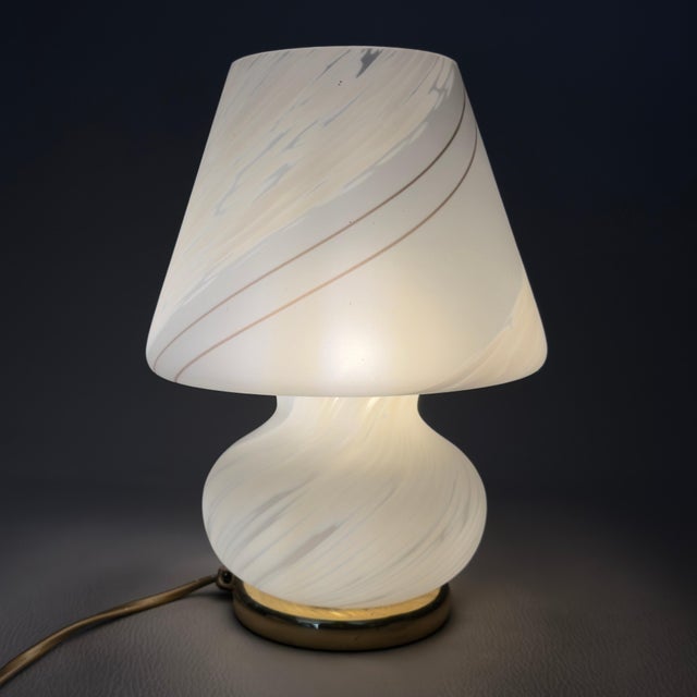 A small, luminous jewel with an unmistakable charm, the perfect expression of Italian Space Age design. This exquisite and...