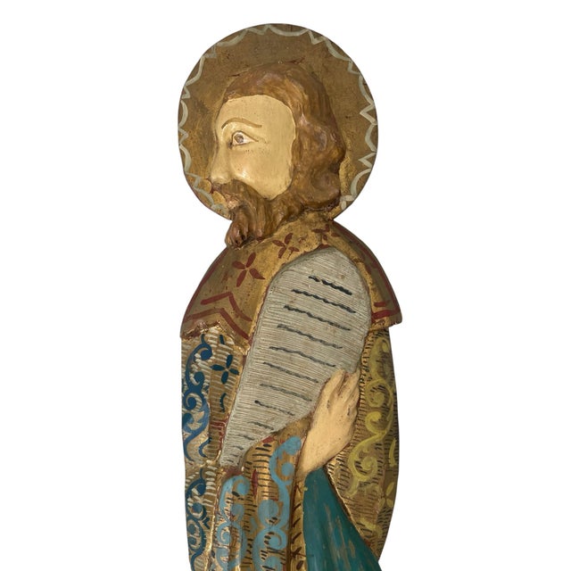 The product is a 28" polychrome Moses hand carved wood wall plaque, originating from Spain. This handmade piece reflects...