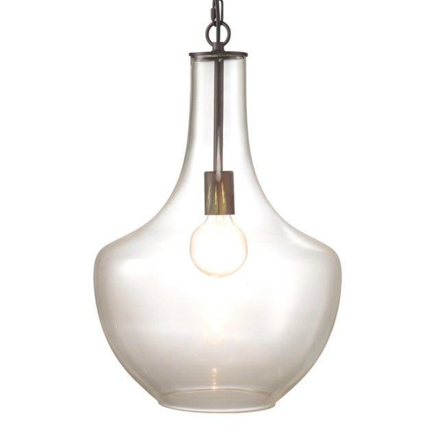 8 foot black cord with 5 inches diameter black metal ceiling cap. Extremely versatile, this clear large glass pendant is...