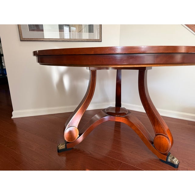 Elegant vintage John Widdicomb furnitue company round foyer table purchaed new in the early 1990's and is very good...