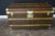 This stunning vintage Louis Vuitton trunk features a magnificent hand-stenciled Monogram canvas, honey-colored diamond-...