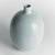 With a simple bulbous silhouette and smooth high gloss finish, the Sandbar Vase by Barclay Butera is modern &...