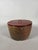 A glazed stoneware water vessel with a lacquered lid, Japan, Edo period (1615-1868). The round, flared water vessel (used...