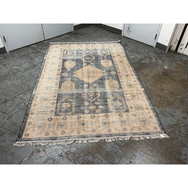 Design Plus Gallery presents a 6ft × 9ft 3in Aracati Navy Blue Wool Area Rug from CB2. Hand-knotted from thick New Zealand...