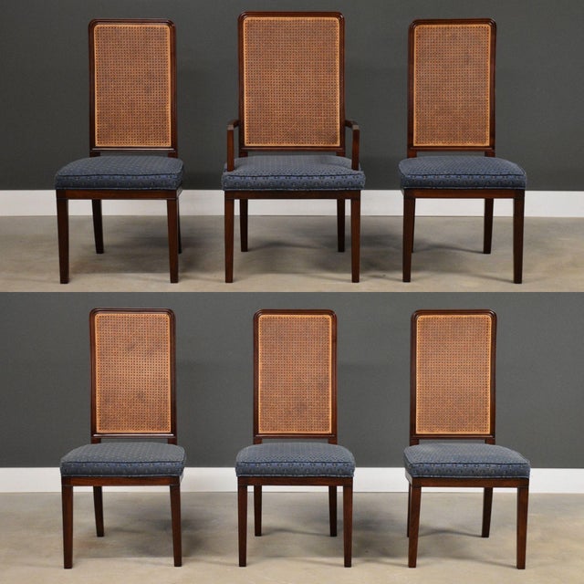 A set of six extremely well made modern solid mahogany dining chairs with beautiful cane backs. Original blue fabric in...