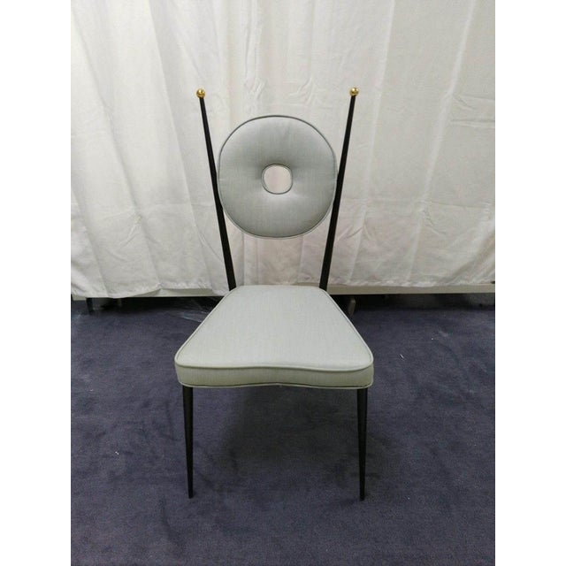 Circle Back. Featuring a blackened steel frame holding a chic donut back cushion suspended, our Rondo Chair is a looker....