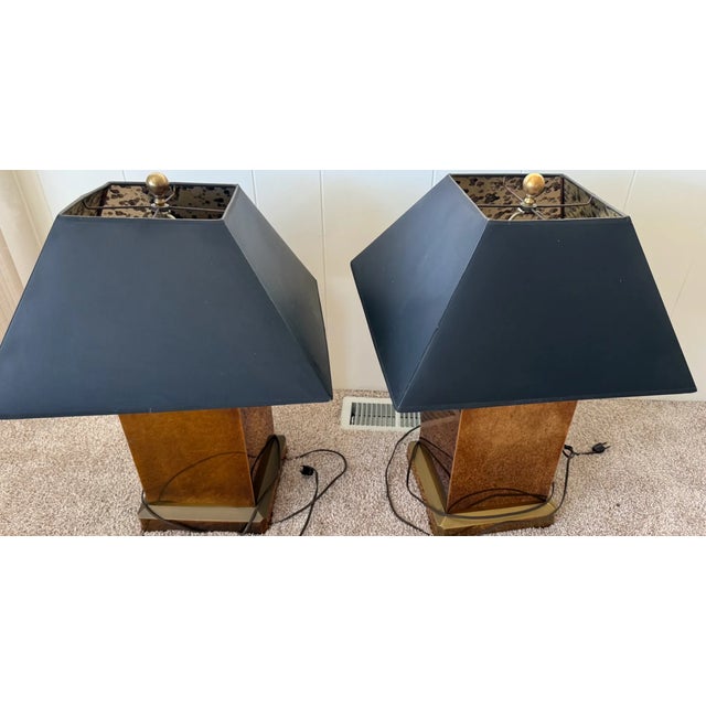 A handsome pair of table lamps by Chapman Manufacturing, one of America's most celebrated mid-century lighting makers,...