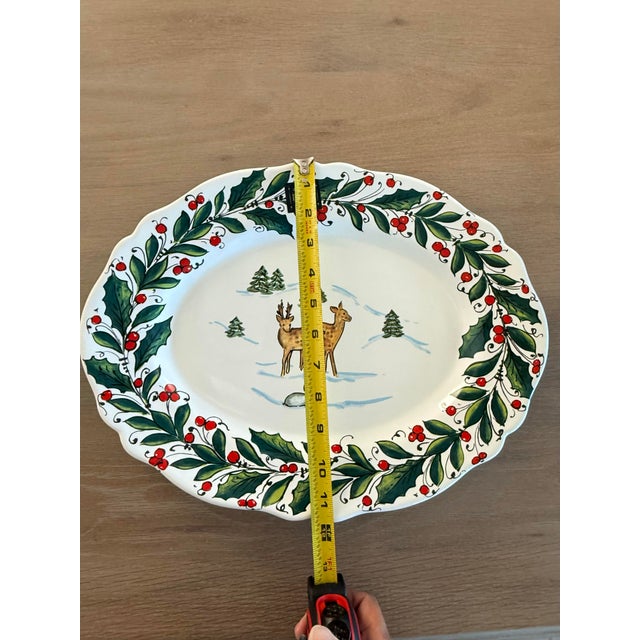 Beautiful platter with a lovely winter scene of holly, snow and deer. This would make a wonderful addition to your holiday...