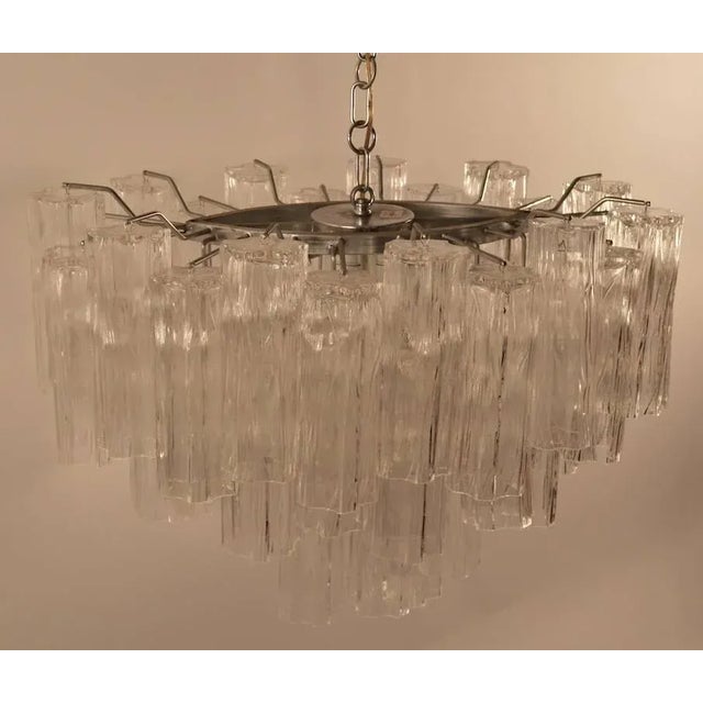 Chandelier marked "Veart Made in Itay" 8"- tubular "Tronchi" shades hang from oval chrome frame. Original chain and canopy...