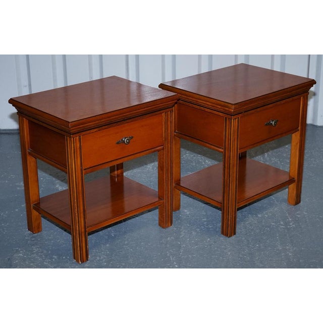 Antiques of London This elegant pair of vintage bedside tables is crafted from solid hardwood and designed in a classic...