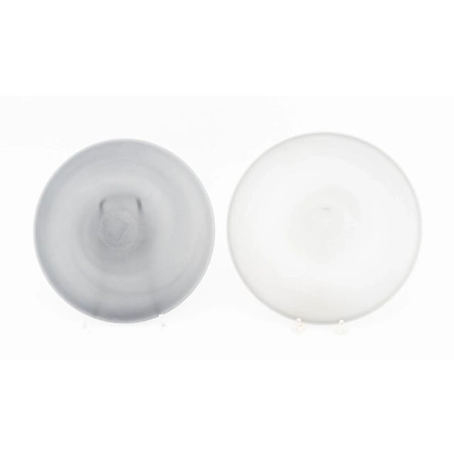 Four Murano Frosted Black Glass Bowls. Larger: 1.75" H x 10.75" Diameter. Provenance: From a Vintage Collection of Italian...