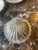Vintage Silver and Glass Shell Caviar Dishes with knife. The silver shell opens to a frosted glass shell that sits inside....