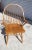 A Late 20th Century Amish crafted Oak Continuous Windsor Armchair with Spindle Back. A true definition of elegance and...