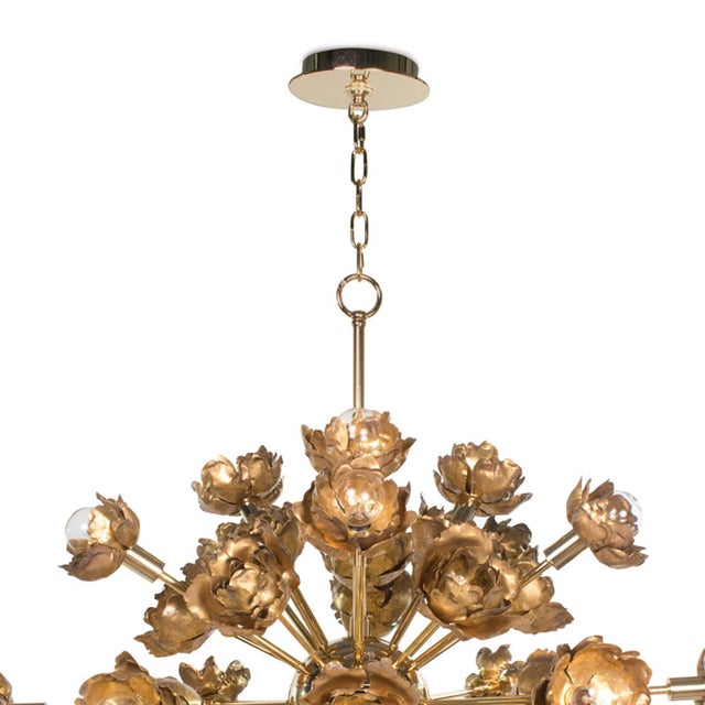 Boasting gold blossom-like accents throughout this piece is a forward-thinking work of art. The abstract yet thoughtful...