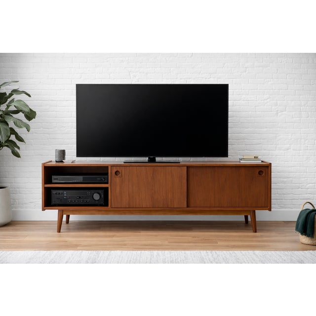Modern walnut mid century styled media console in a difficult to find low height, featuring clean architectural lines and...