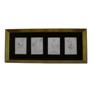 Vintage Bisque Porcelain Cherub Plaques in a Custom Frame. (4 Figures) For Sale