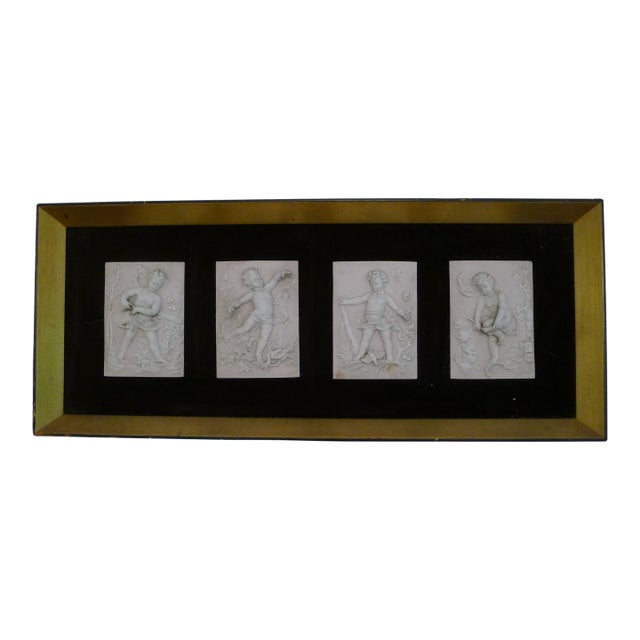 Vintage Bisque Porcelain Cherub Plaques in a Custom Frame. (4 Figures) For Sale