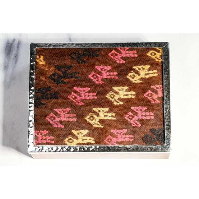 A striking piece of Peruvian craftsmanship, this vintage artisan box beautifully combines rich natural wood, hand-worked...