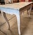 Wonderful Louis XV style console table with carved frame paired with a stunning marble top. The console table originated...