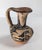 We are selling this nice small Native American Indian pottery pitcher. We believe this pitcher or ewer to be from the...