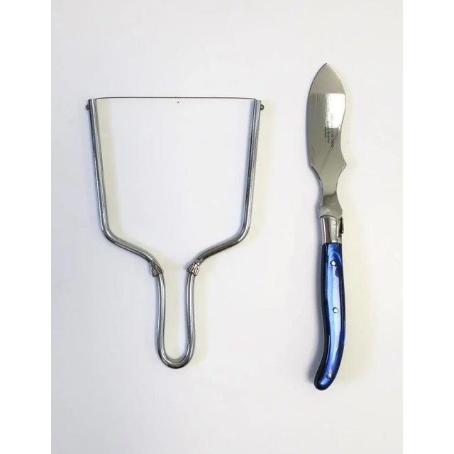 A well-made French pâté cutlery service set by Claude Dozorme, circa late-20th to early 21st century, France. Set is...