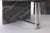 Pair of granite cofee tables with chromed steel structure, realized by an italian manufacture in 1980s. Sculptural and...
