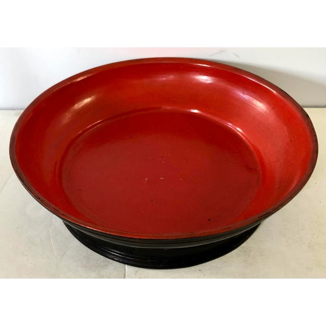 Burmese lacquered serving bowl with inscription on the side.