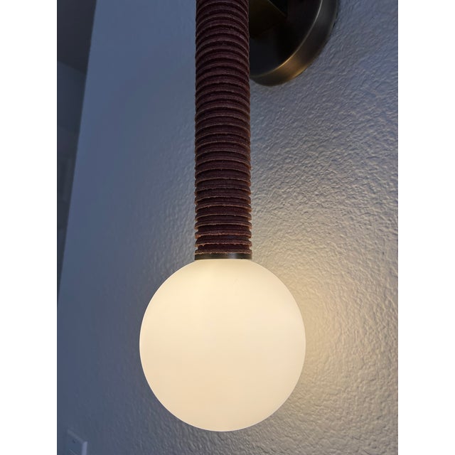 Mid-Century Modern One of a Kind Artisan Wall Sconce Aged Brass Brown Stacked Leather Disks For Sale - Image 3 of 13