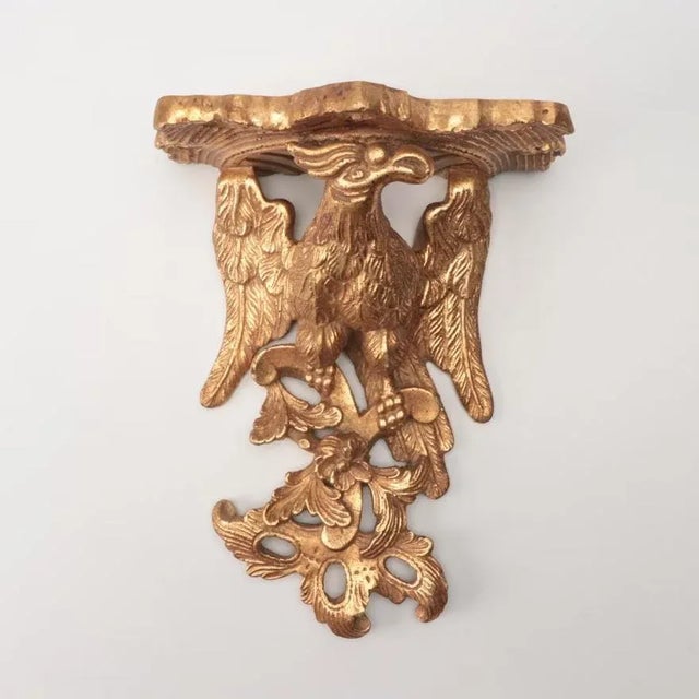 A gorgeous pair of large scale Neoclassical , Federal or Regency style gold gilt wall sconces, shelves, or brackets...